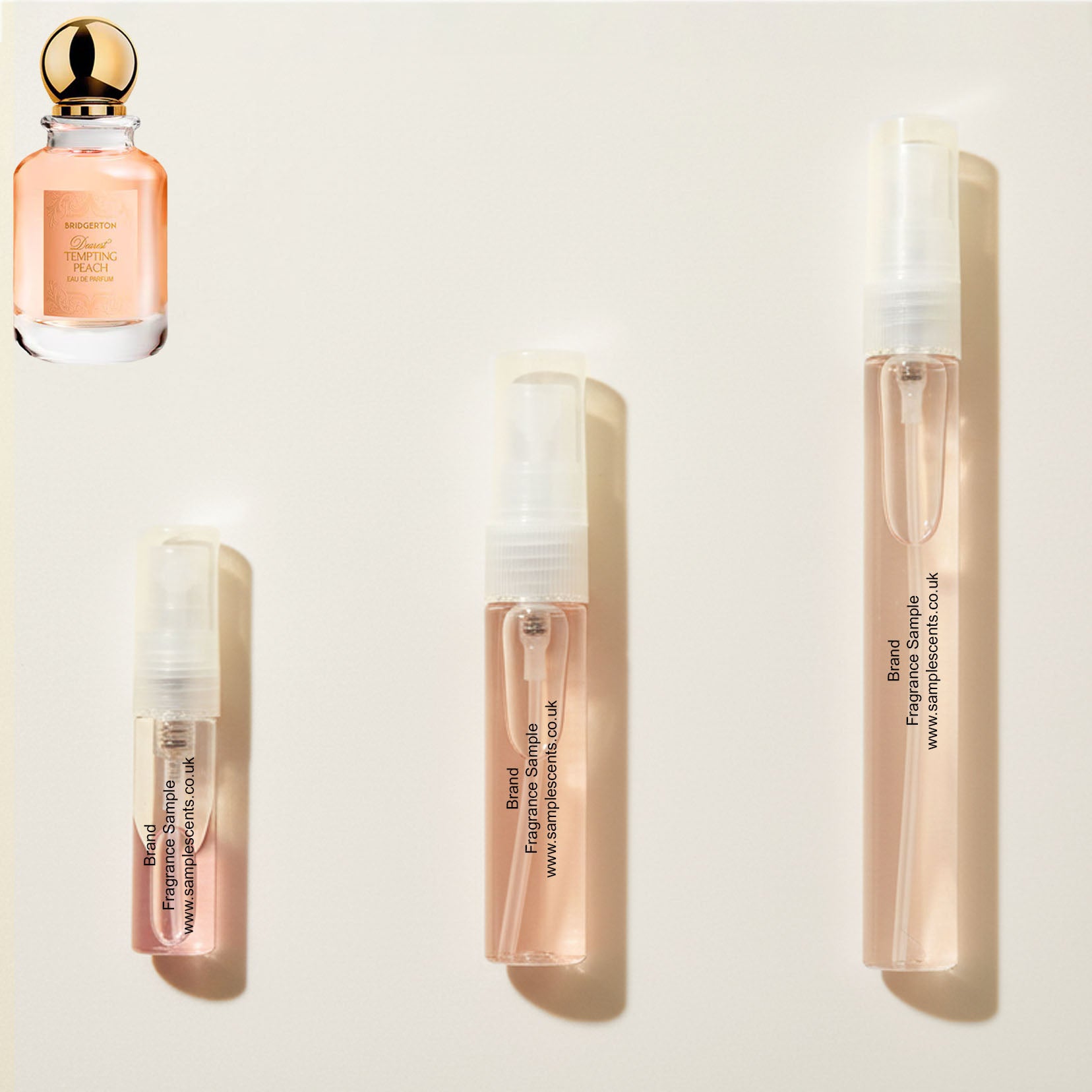 Perfume sample atomisers shown for size reference, hand-decanted from Bridgerton Dearest Tempting Peach bottle.