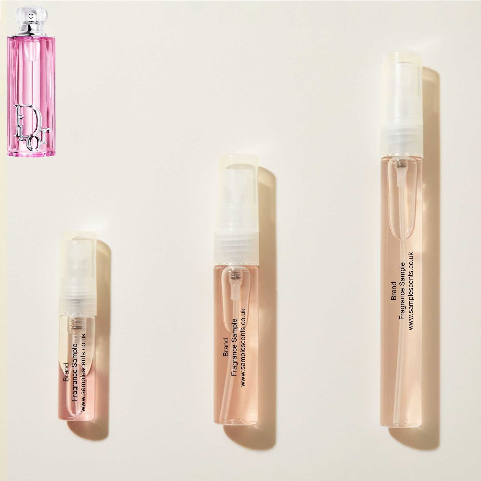 Perfume sample atomisers shown for size reference, hand-decanted from Dior Addict Rosy Glow bottle.