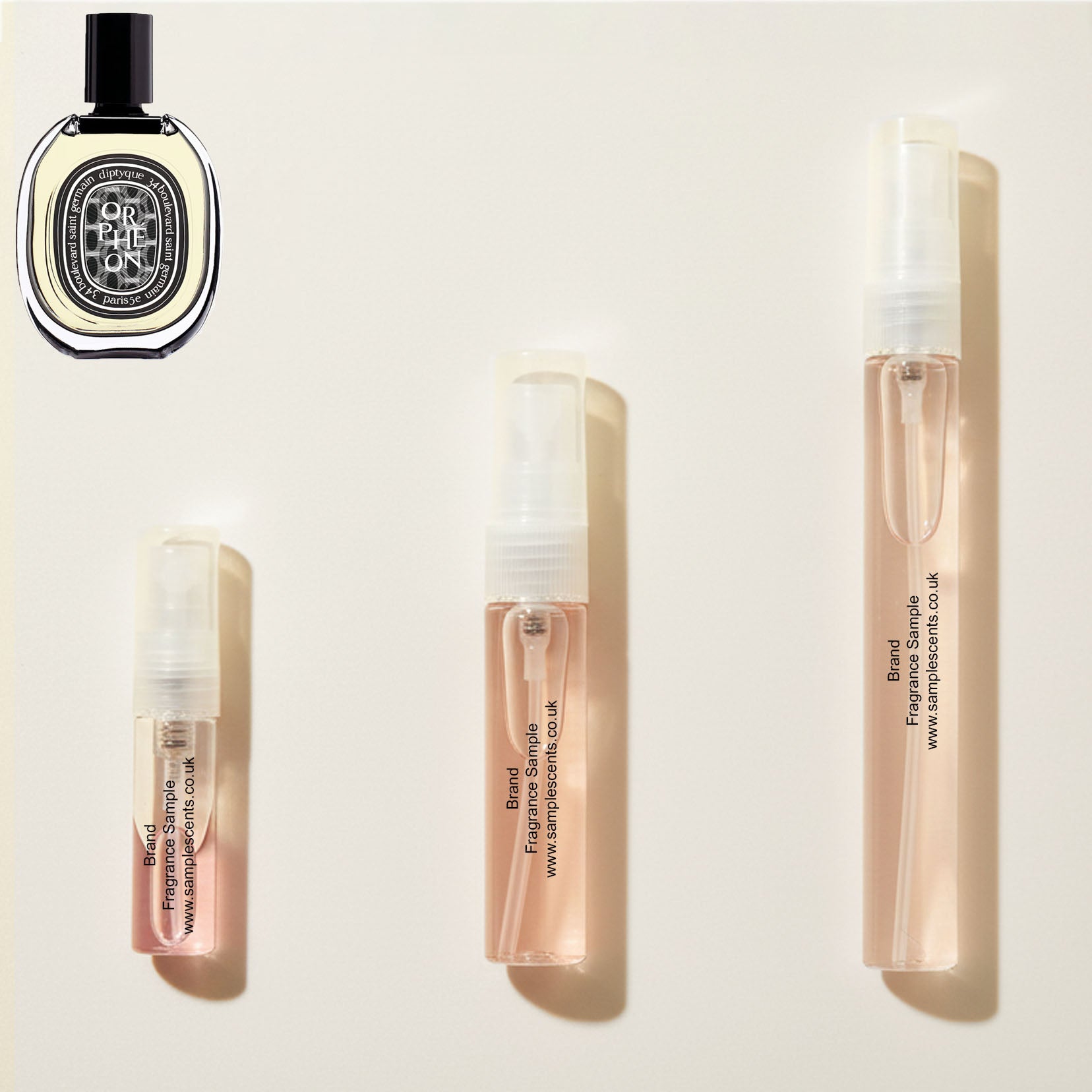 Perfume sample atomisers shown for size reference, hand-decanted from Diptyque Orpheon bottle.