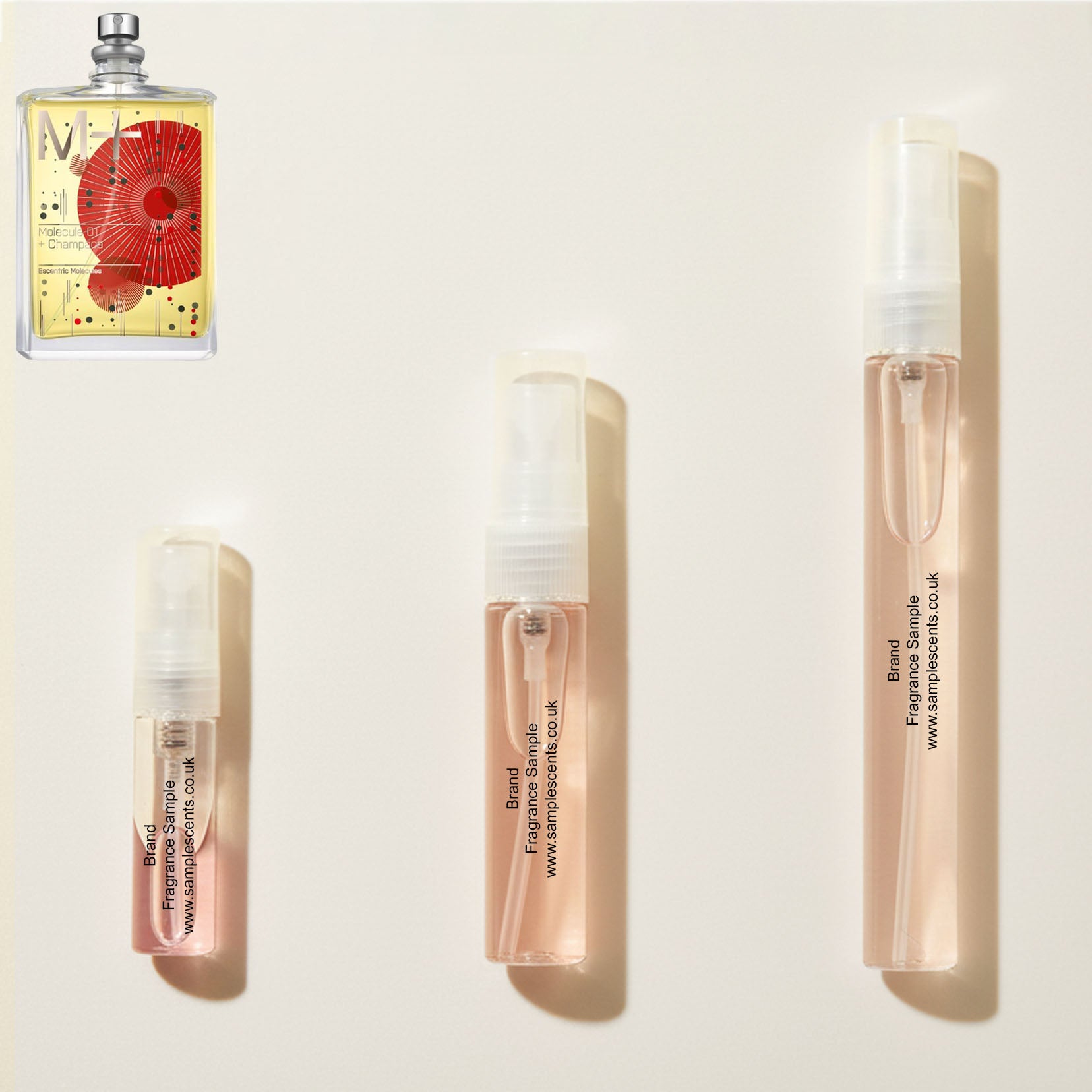 Perfume sample atomisers shown for size reference, hand-decanted from Escentric Molecules Molecule 01 + Champaca bottle.