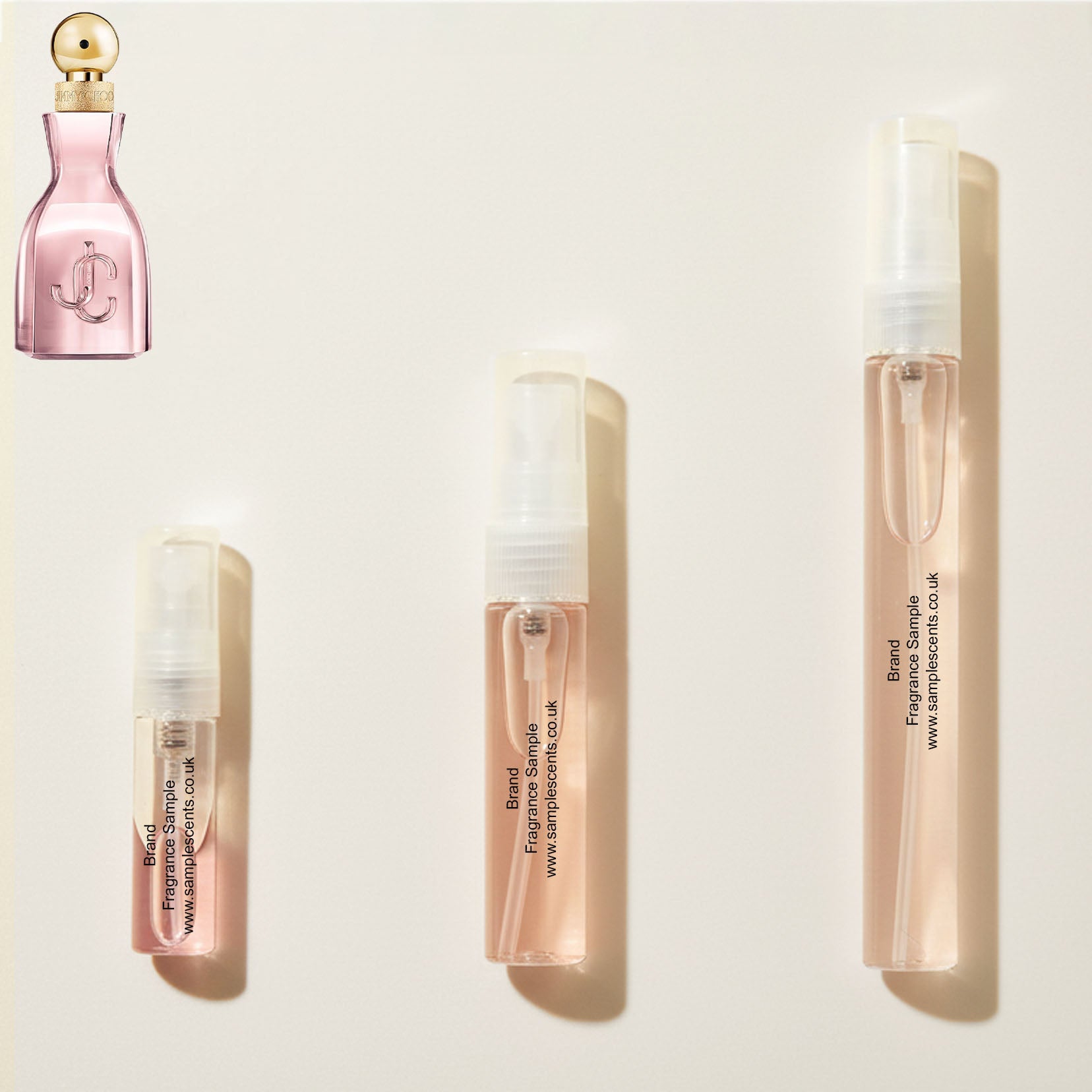 Perfume sample atomisers shown for size reference, hand-decanted from Jimmy Choo I Want Choo With Love bottle.