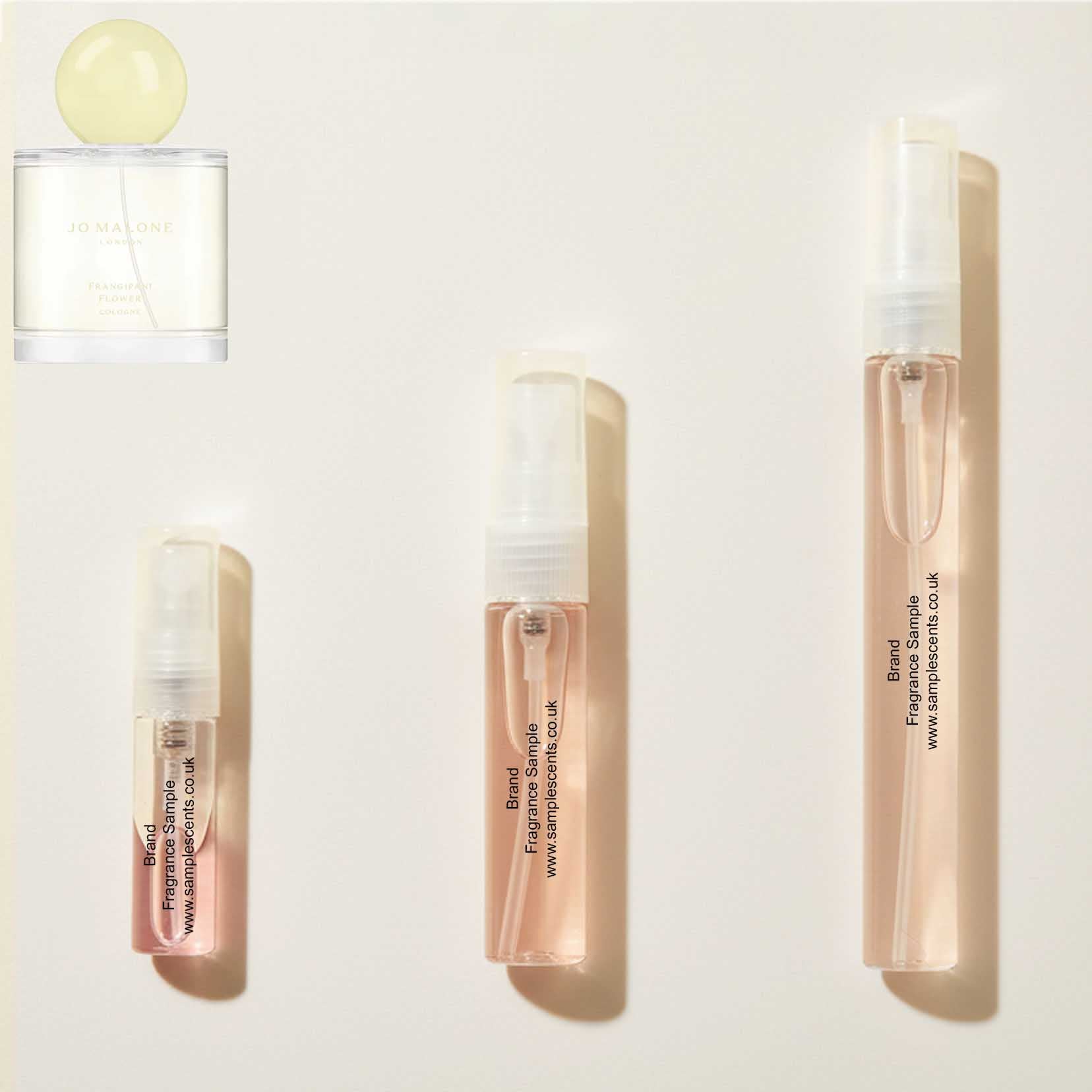 Perfume sample atomisers shown for size reference, hand-decanted from Jo Malone London Frangipani Flower bottle.