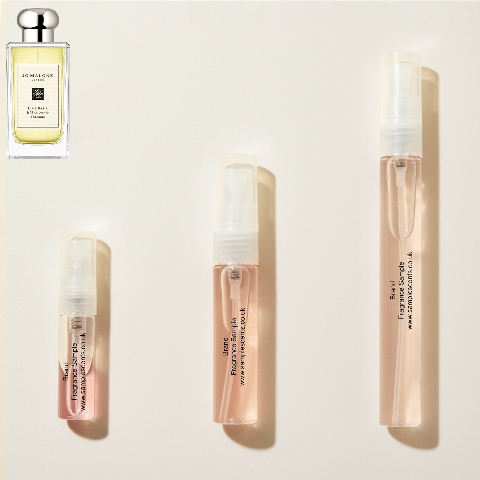 Perfume sample atomisers shown for size reference, hand-decanted from Jo Malone London Lime Basil & Mandarin bottle.