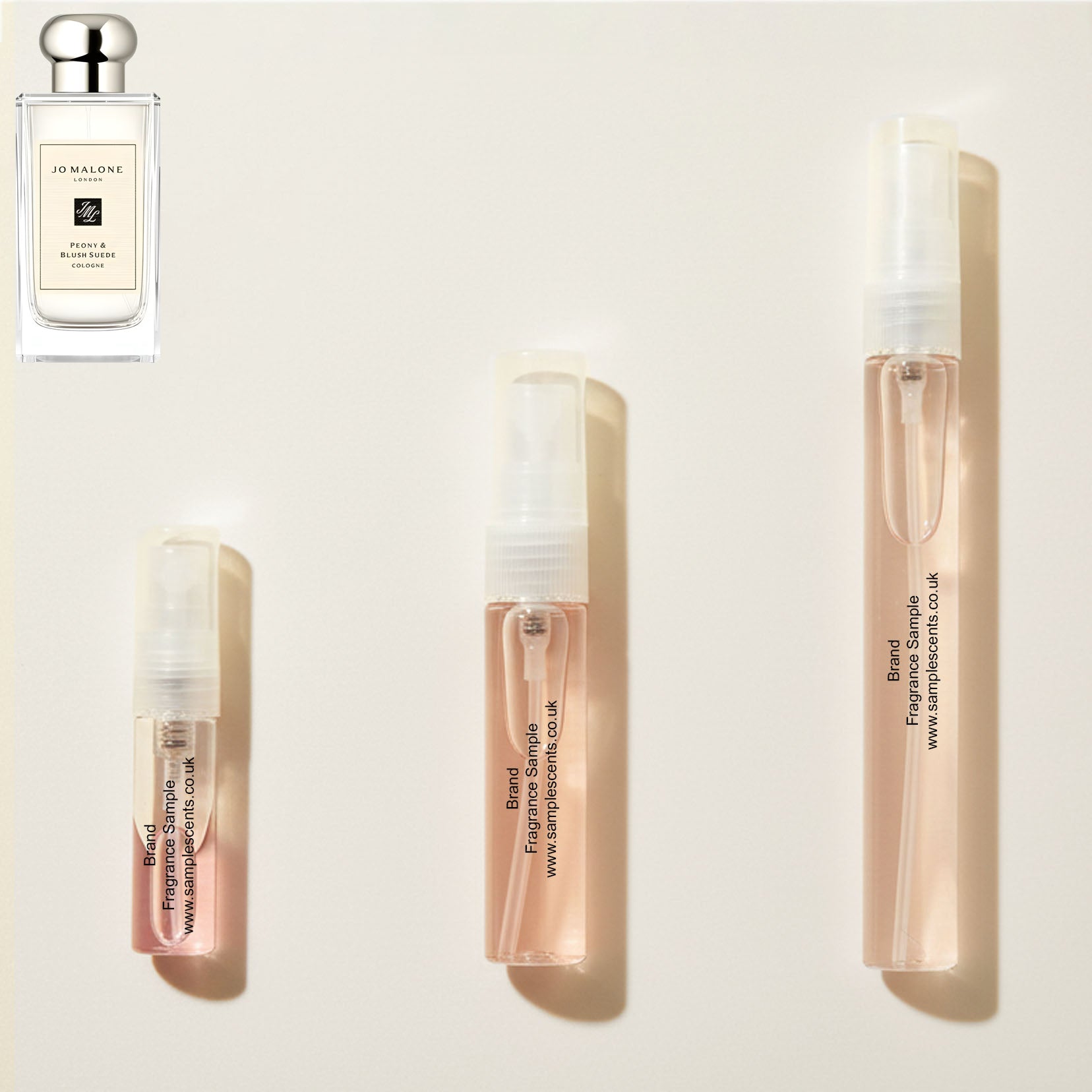 Perfume sample atomisers shown for size reference, hand-decanted from Jo Malone London Peony & Blush Suede bottle.
