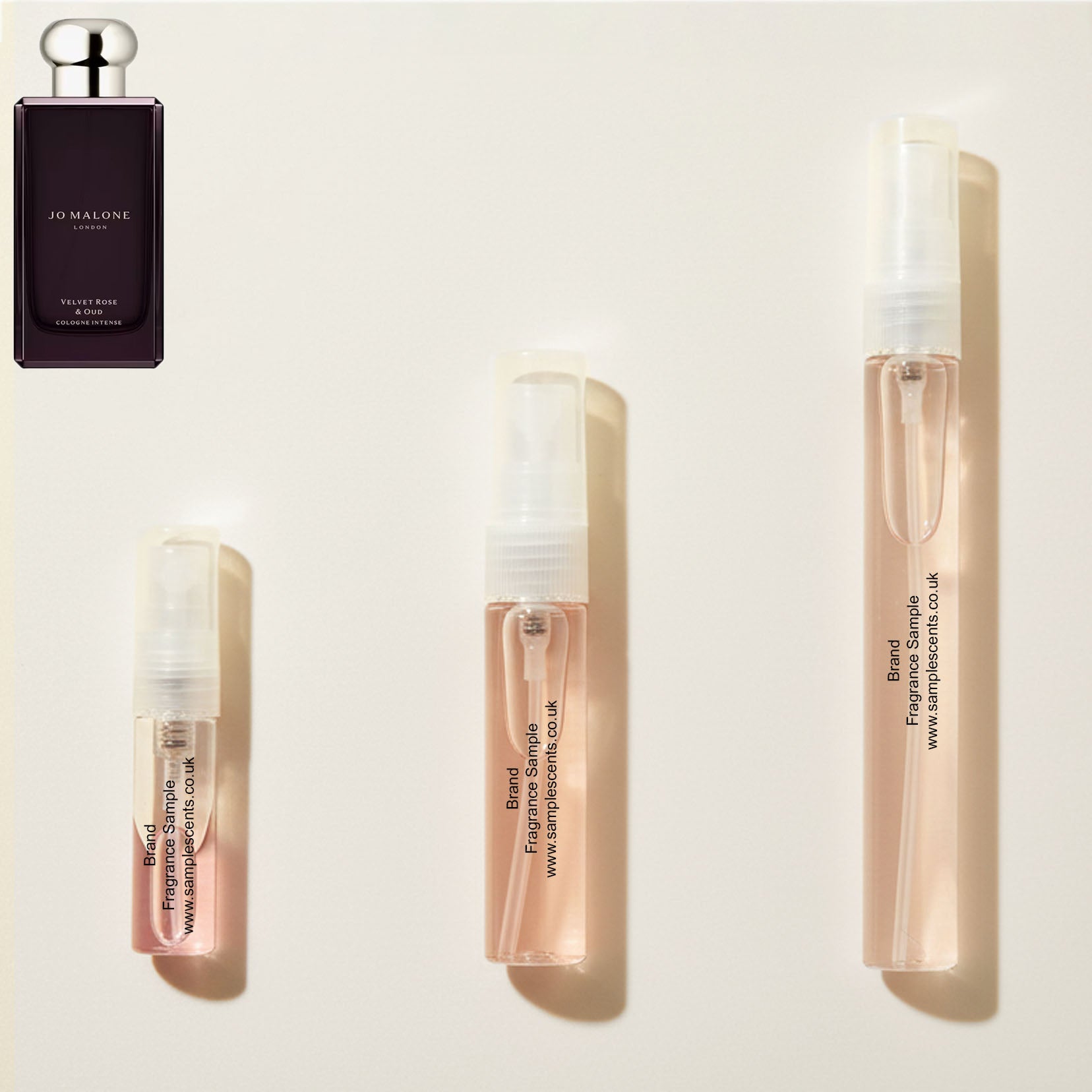 Perfume sample atomisers shown for size reference, hand-decanted from Jo Malone London Velvet Rose & Oud bottle.