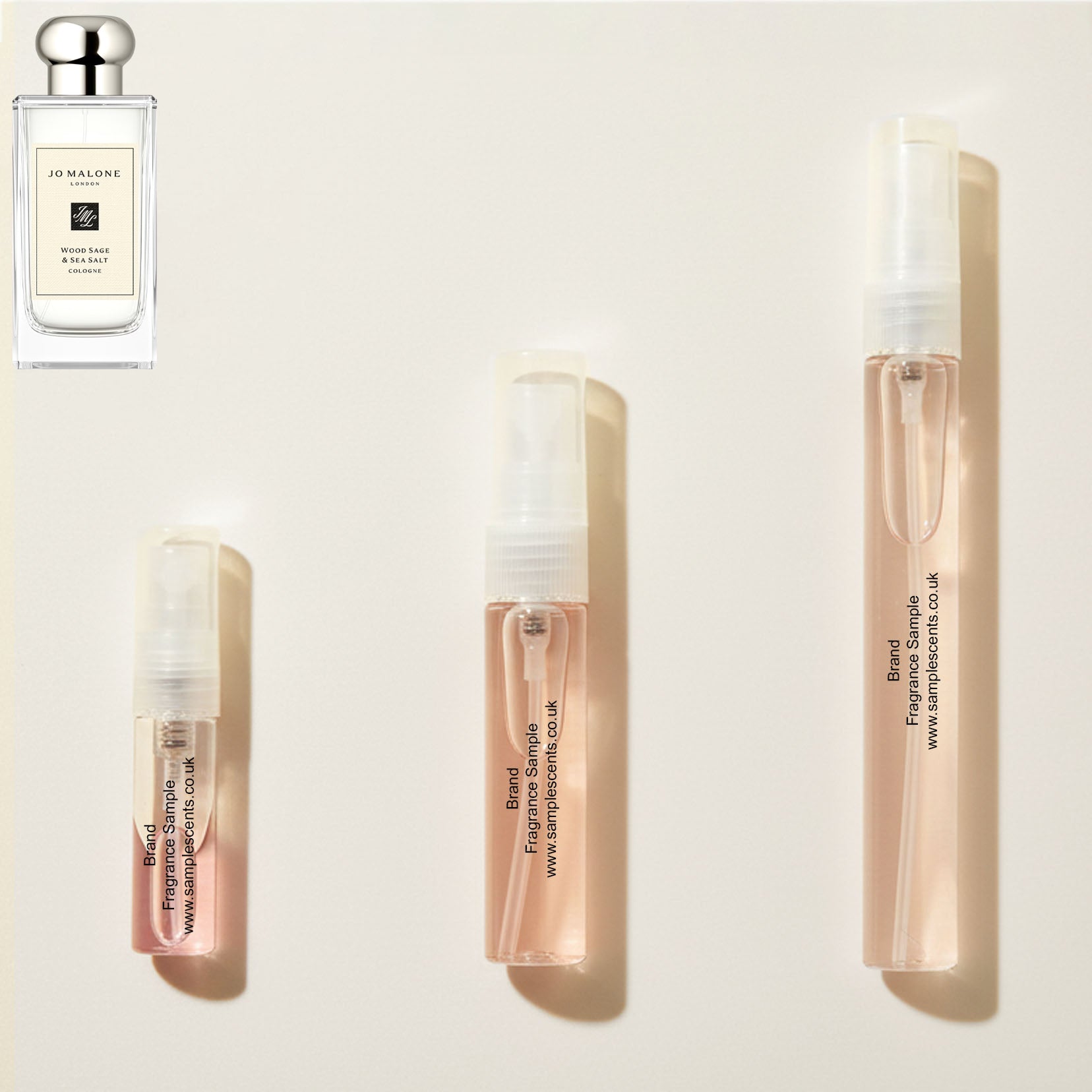 Perfume sample atomisers shown for size reference, hand-decanted from Jo Malone London Wood Sage & Sea Salt bottle.