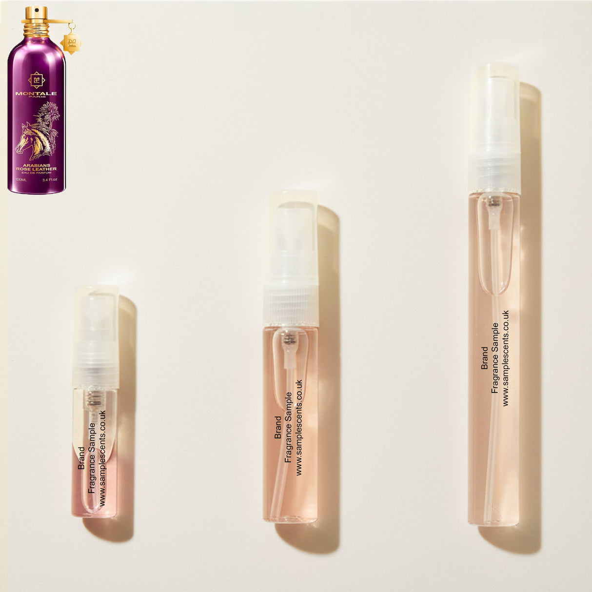 Perfume sample atomisers shown for size reference, hand-decanted from Montale Arabians Rose Leather bottle.