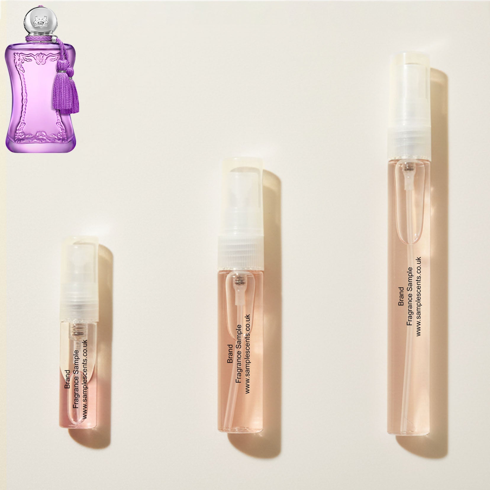 Perfume sample atomisers shown for size reference, hand-decanted from Parfums De Marly Palatine bottle.