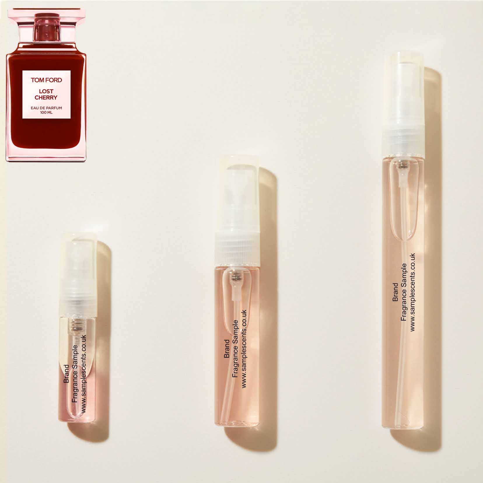 Perfume sample atomisers shown for size reference, hand-decanted from Tom Ford Lost Cherry bottle.