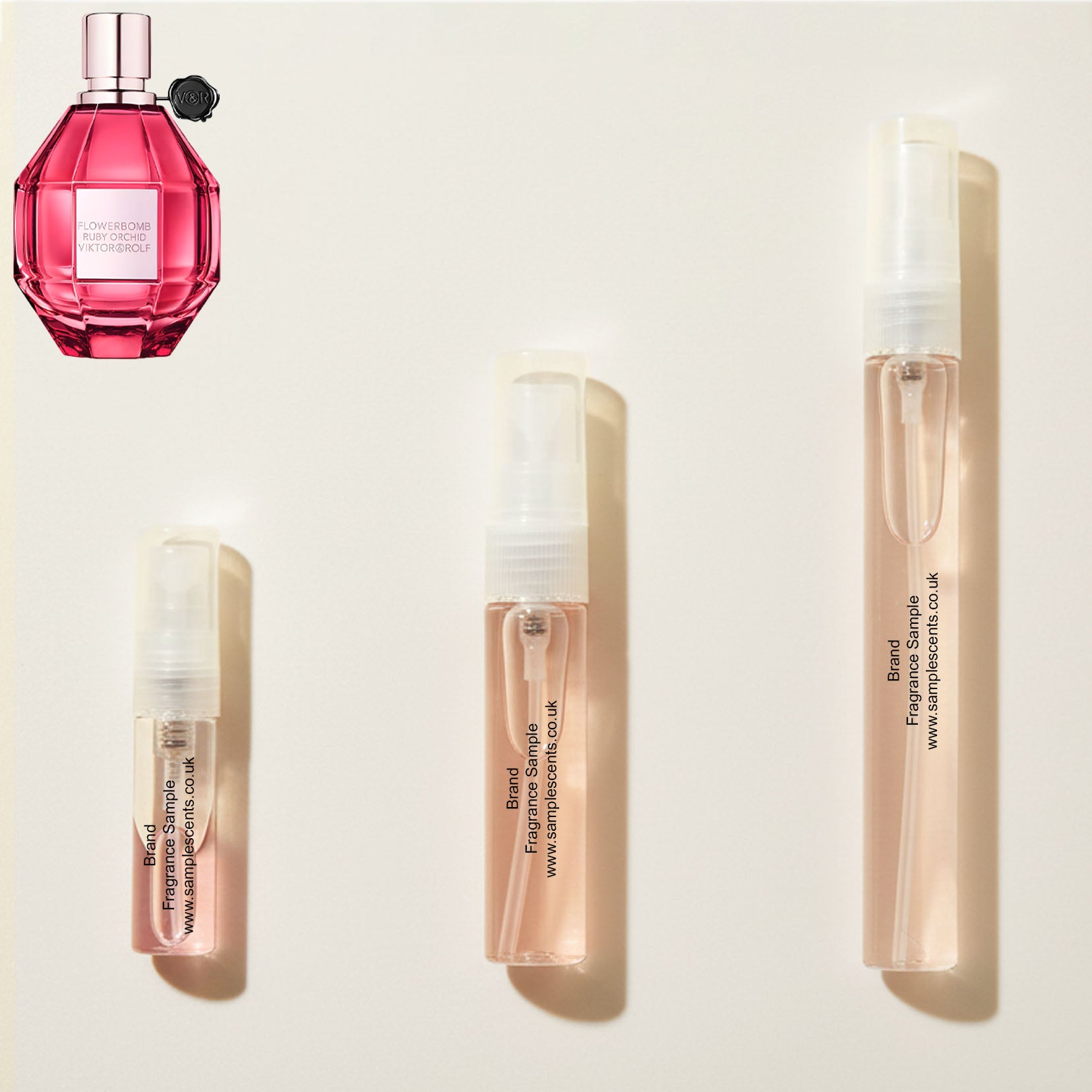 Perfume sample atomisers shown for size reference, hand-decanted from Viktor & Rolf Flowerbomb Ruby Orchid bottle.