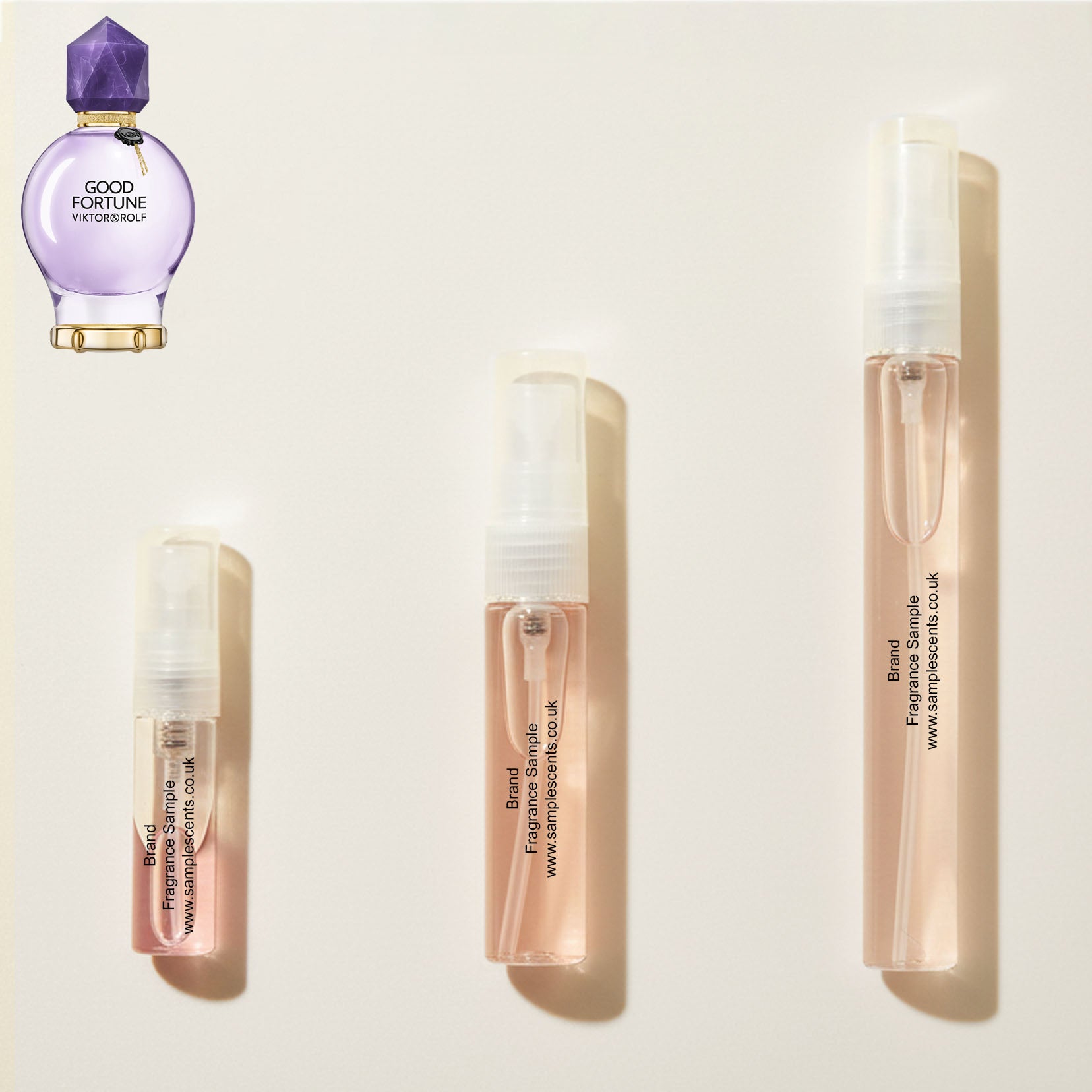 Perfume sample atomisers shown for size reference, hand-decanted from Viktor & Rolf Good Fortune bottle.