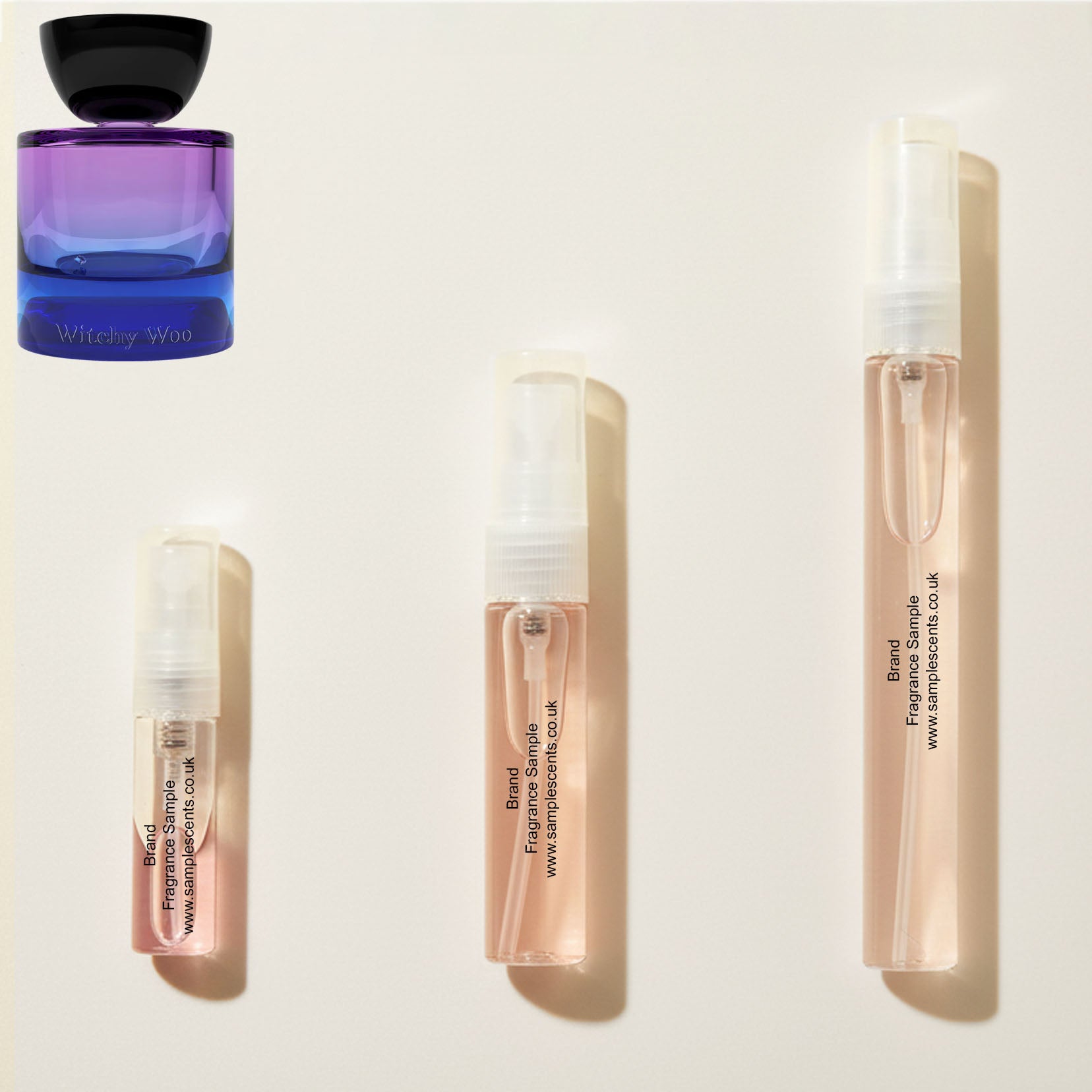 Perfume sample atomisers shown for size reference, hand-decanted from Vyrao Witchy Woo bottle.