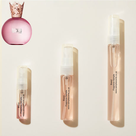 Perfume sample atomisers shown for size reference, hand-decanted from Ariana Grande Glinda Bubbly Pink bottle.