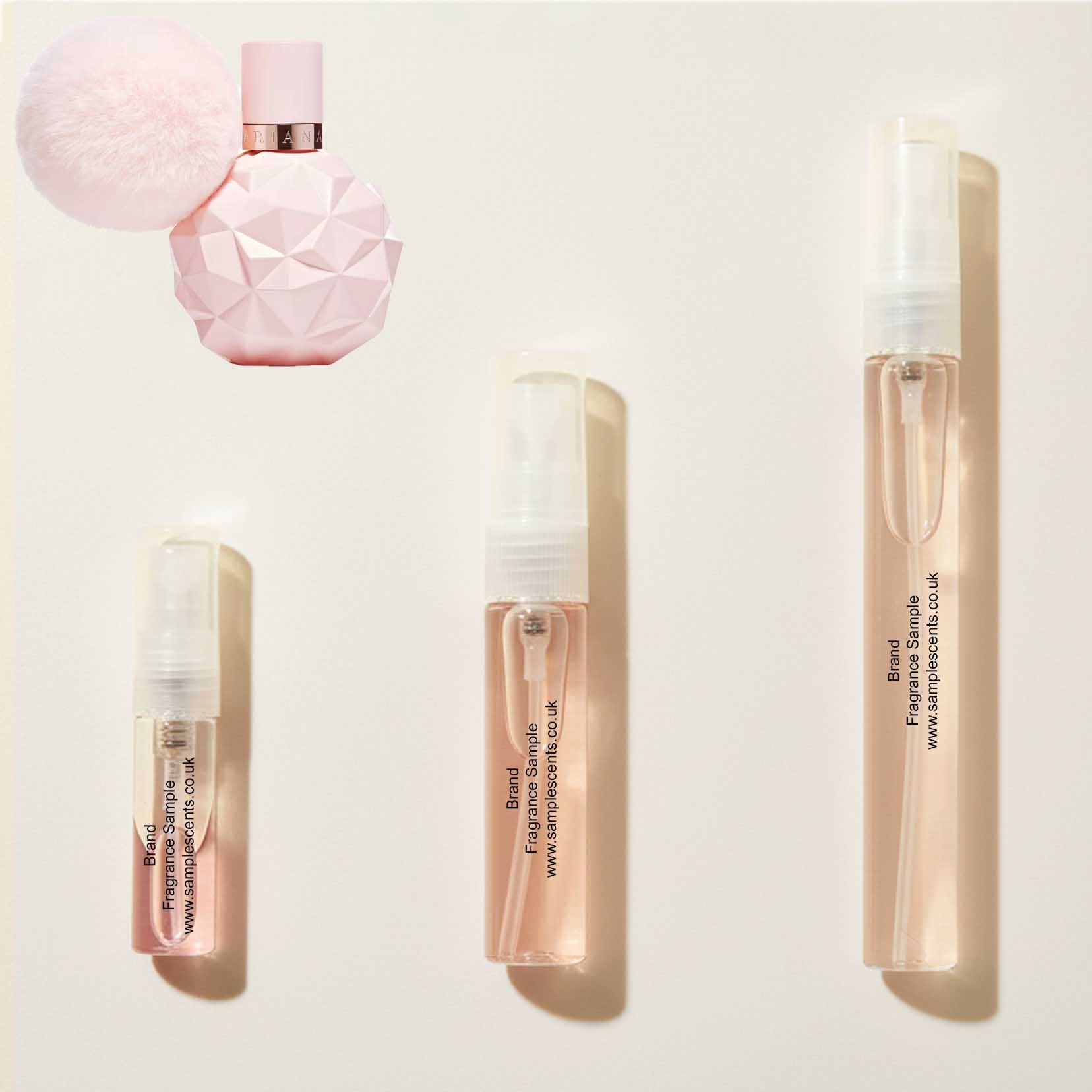Perfume sample atomisers shown for size reference, hand-decanted from Ariana Grande Sweet Like Candy bottle.