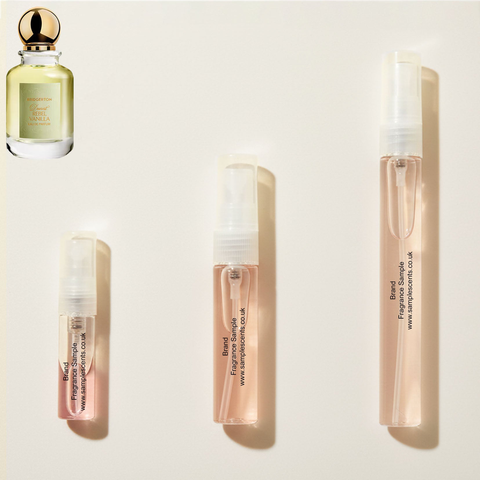 Perfume sample atomisers shown for size reference, hand-decanted from Bridgerton Dearest Rebel Vanilla bottle.