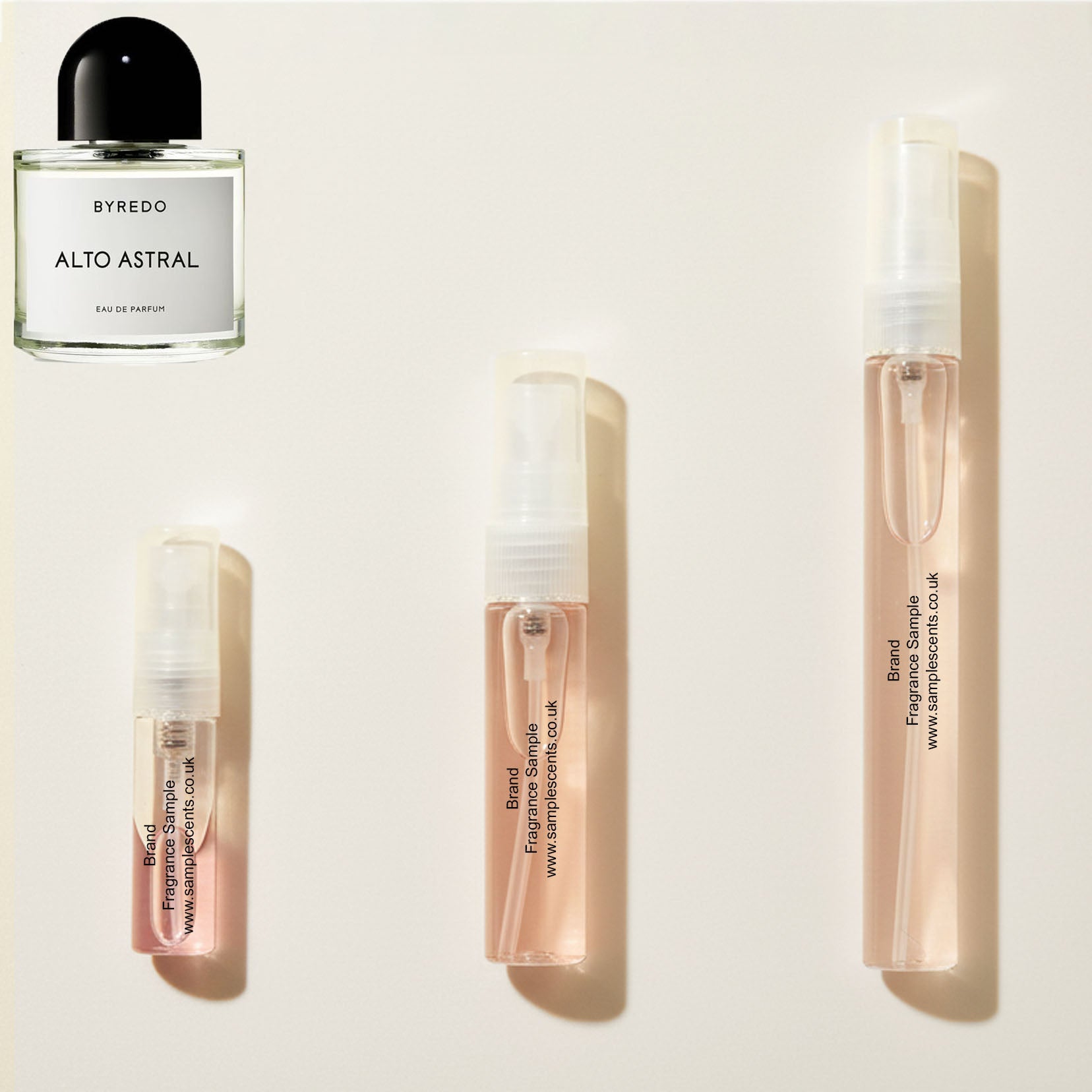 Perfume sample atomisers shown for size reference, hand-decanted from Byredo Alto Astral bottle.