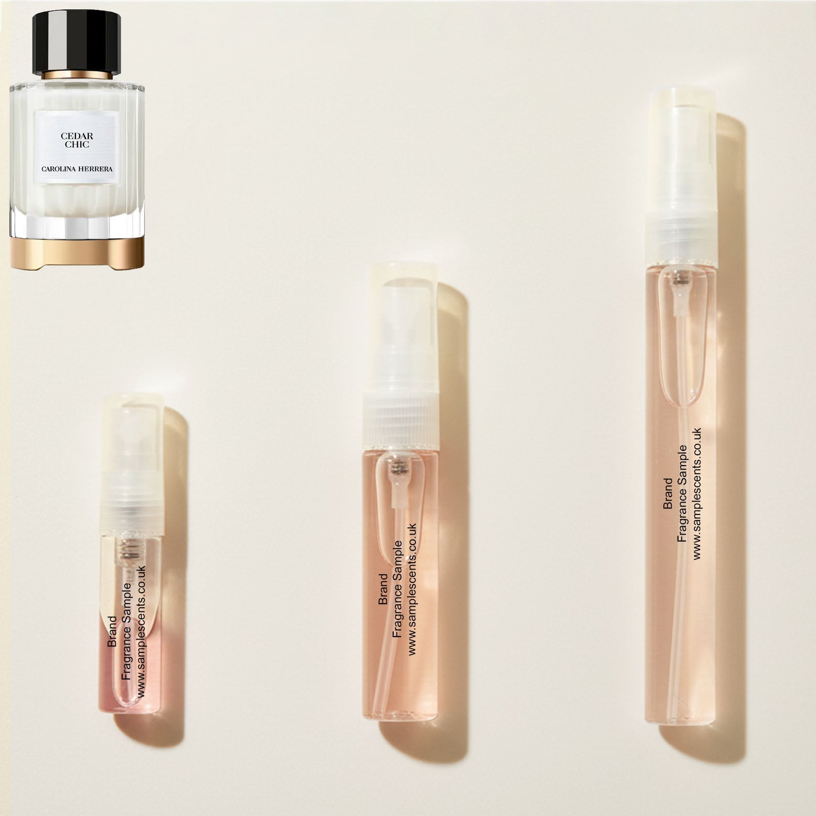 Perfume sample atomisers shown for size reference, hand-decanted from Carolina Herrera Cedar Chic bottle.