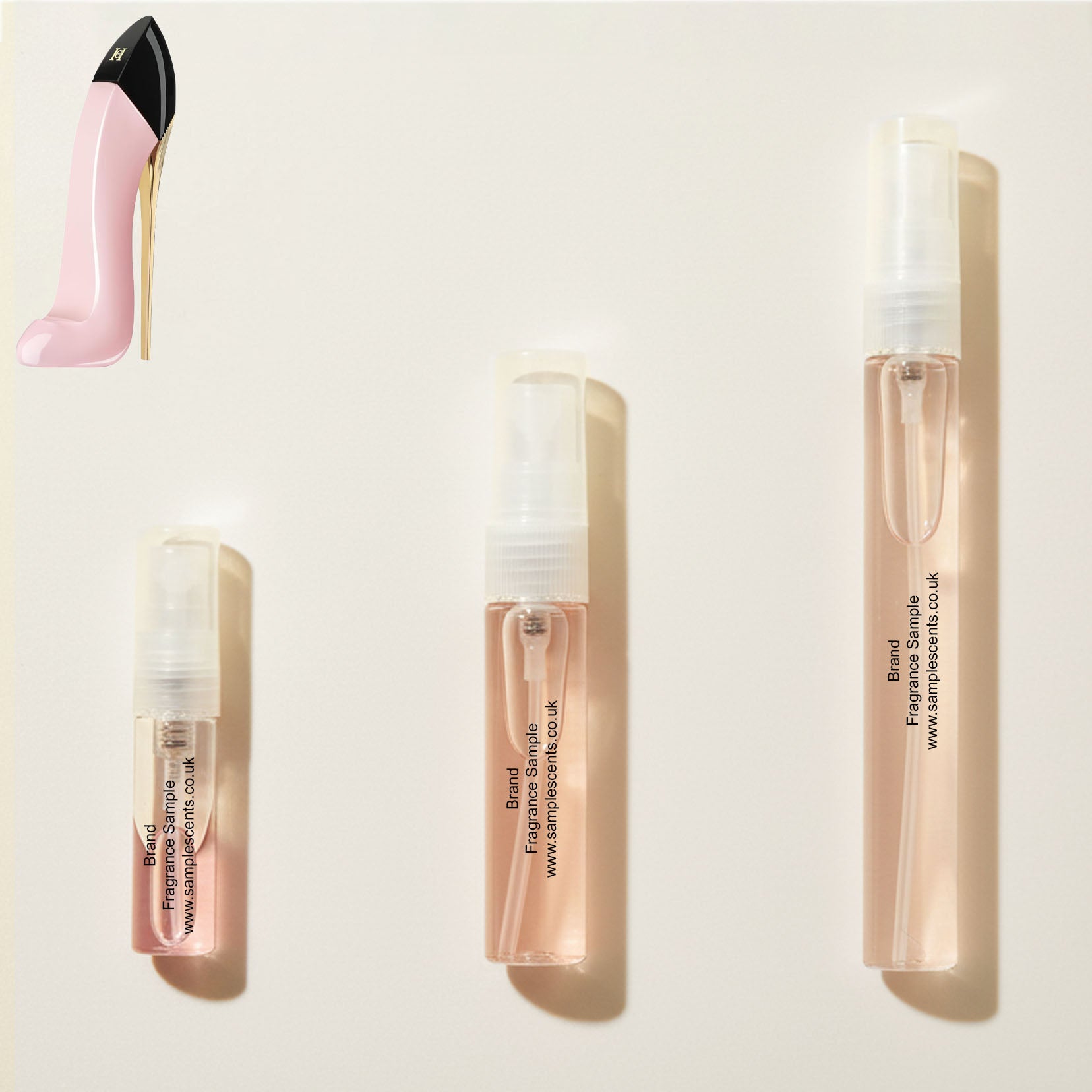 Perfume sample atomisers shown for size reference, hand-decanted from Carolina Herrera Good Girl Blush bottle.