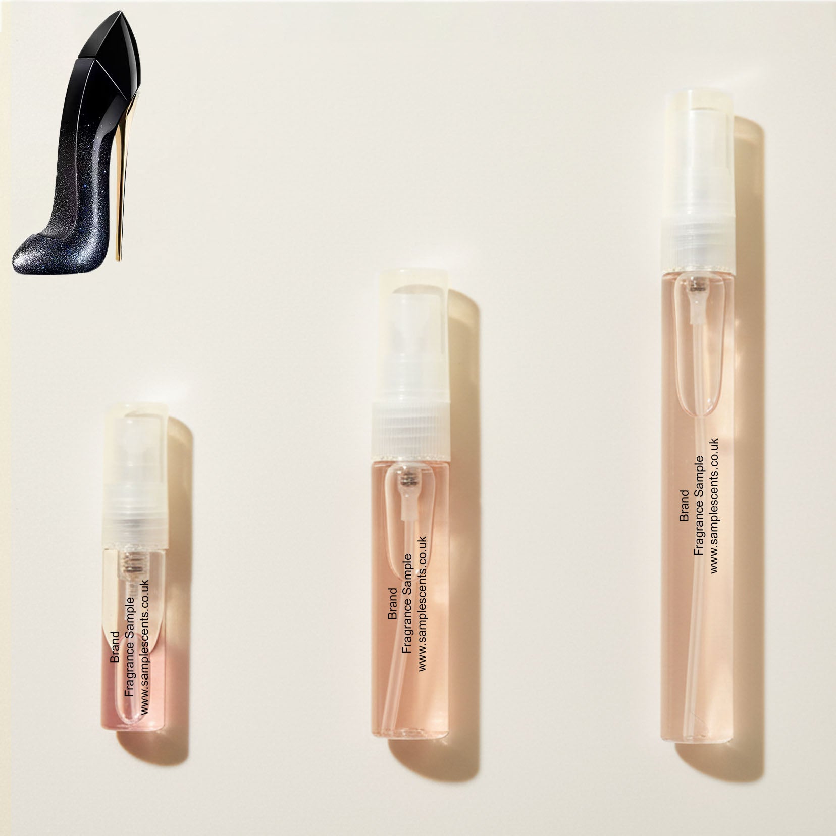 Perfume sample atomisers shown for size reference, hand-decanted from Carolina Herrera Good Girl Supreme bottle.