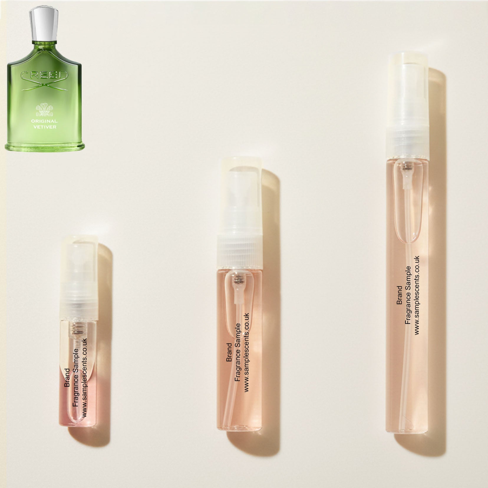 Perfume sample atomisers shown for size reference, hand-decanted from Creed Original Vetiver bottle.