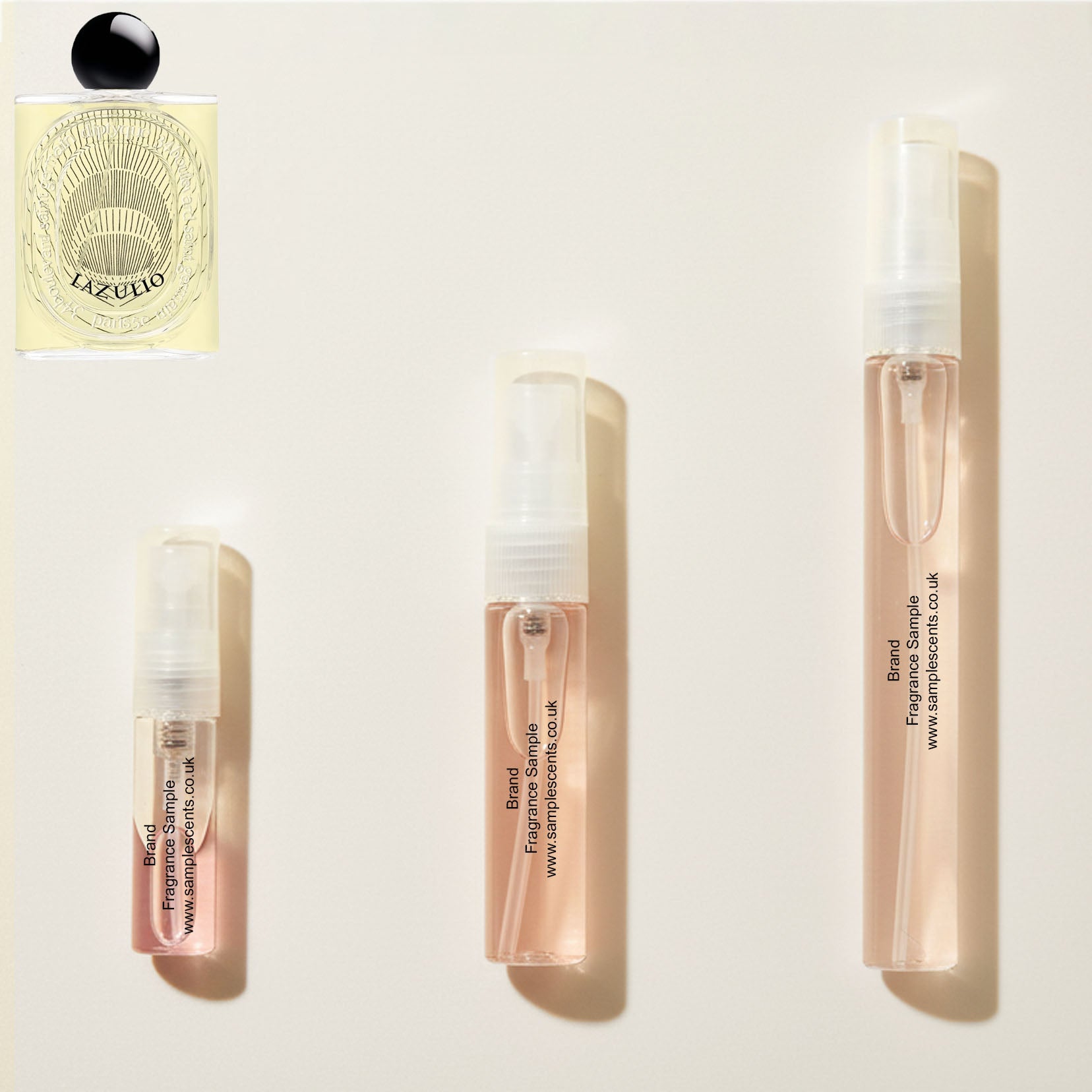 Perfume sample atomisers shown for size reference, hand-decanted from Diptyque Lazulio bottle.