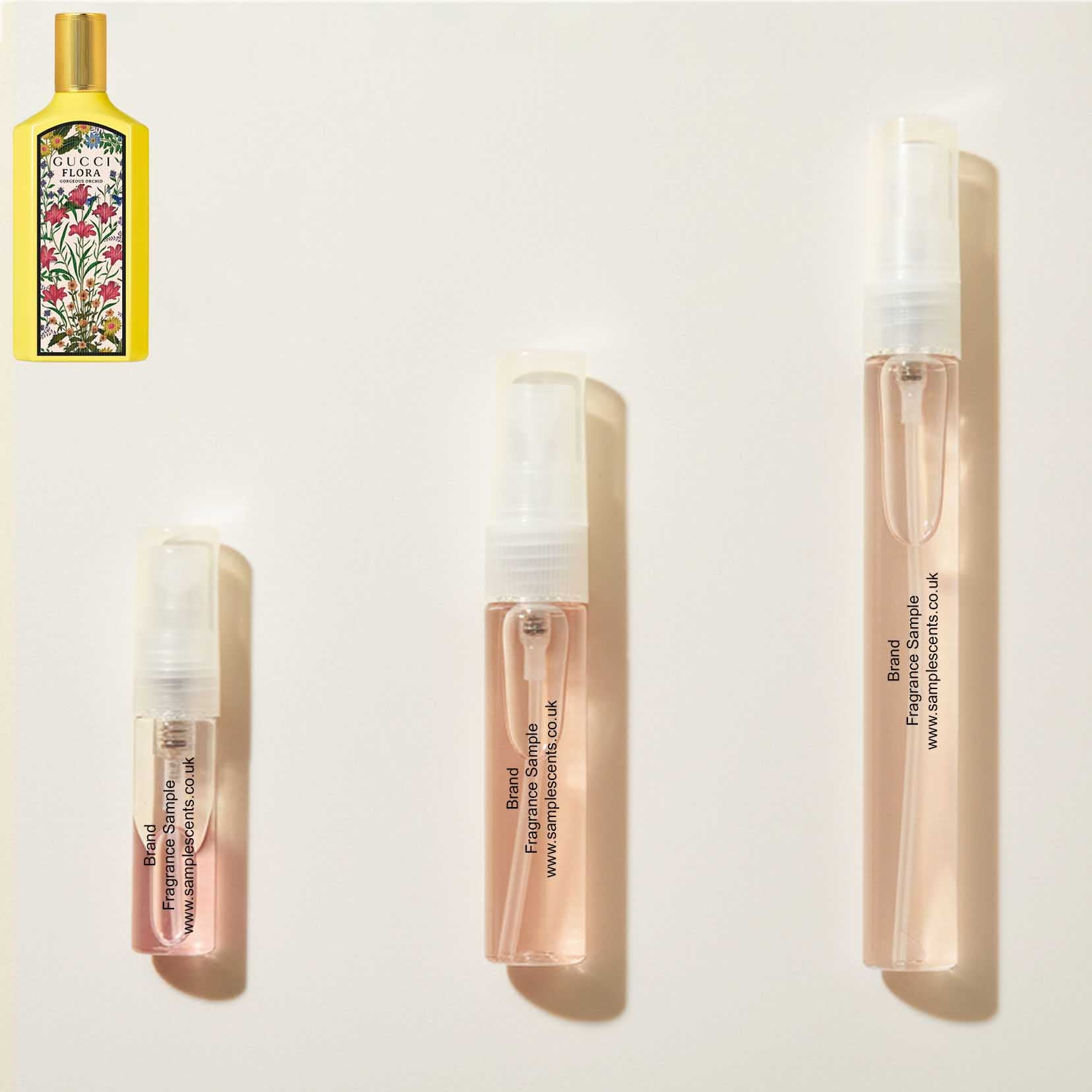 Perfume sample atomisers shown for size reference, hand-decanted from Gucci Flora Gorgeous Orchid bottle.