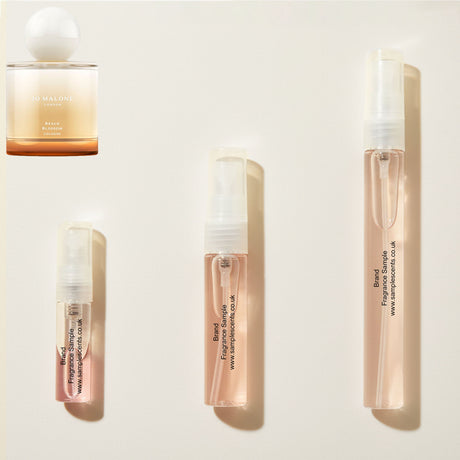 Perfume sample atomisers shown for size reference, hand-decanted from Jo Malone London Beach Blossom bottle.
