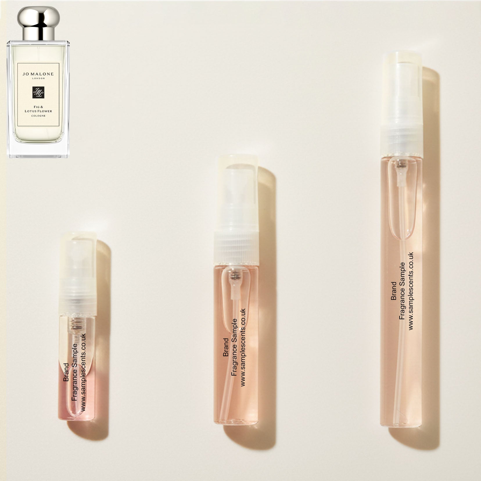 Perfume sample atomisers shown for size reference, hand-decanted from Jo Malone London Fig & Lotus Flower bottle.