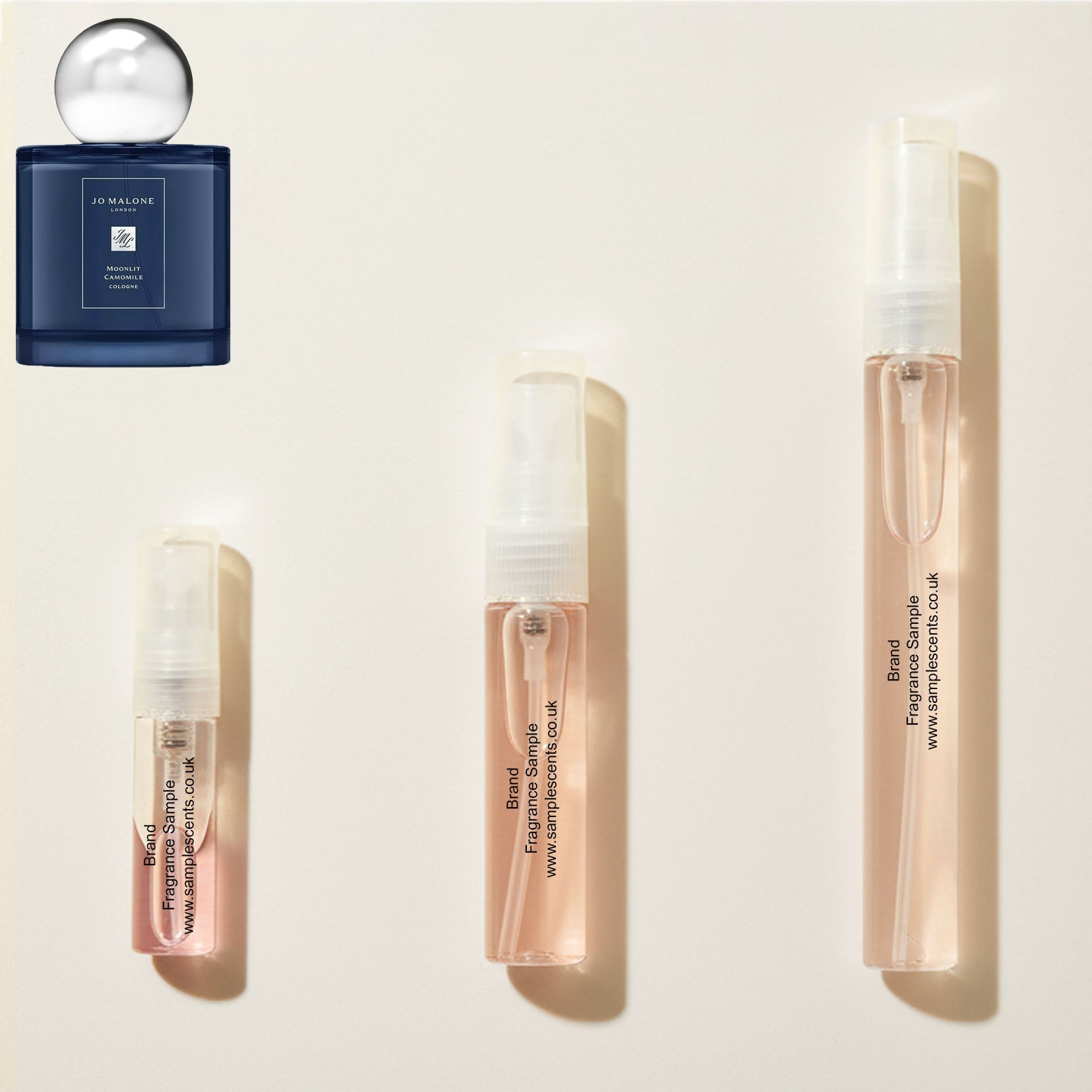 Perfume sample atomisers shown for size reference, hand-decanted from Jo Malone London Moonlit Camomile bottle.