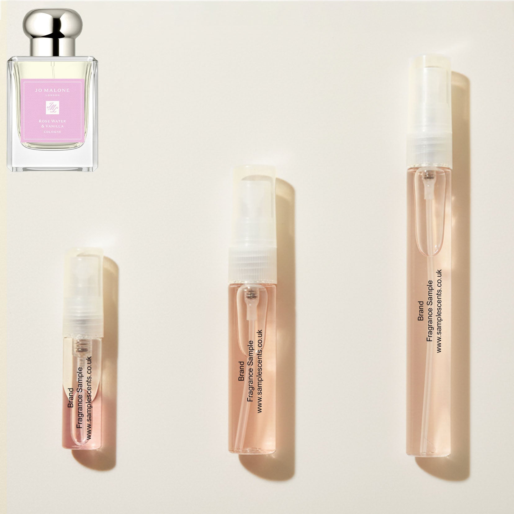 Perfume sample atomisers shown for size reference, hand-decanted from Jo Malone London Rose Water & Vanilla bottle.