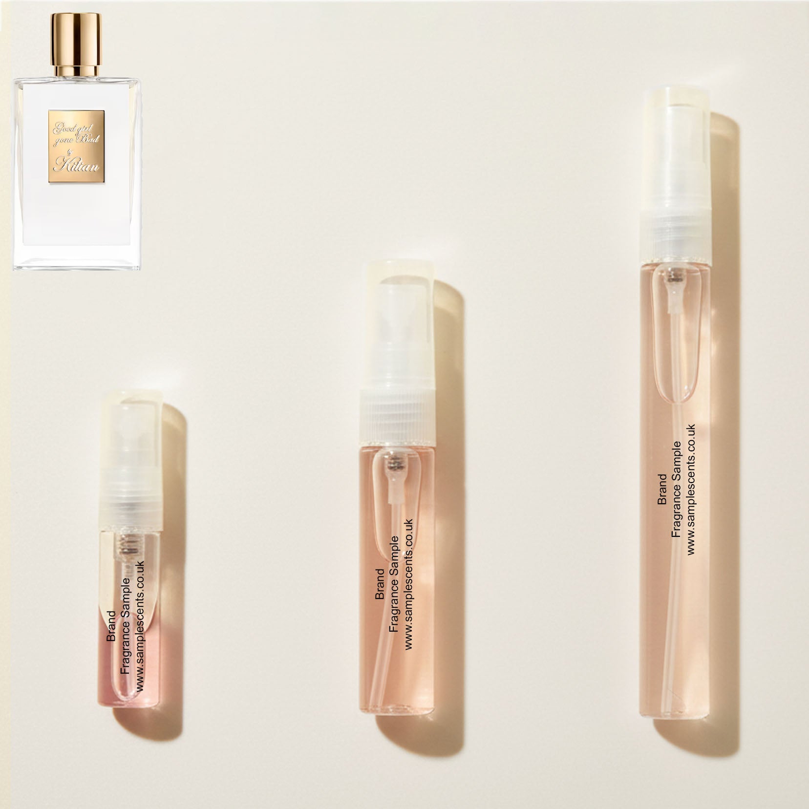 Perfume sample atomisers shown for size reference, hand-decanted from Kilian Good Girl Gone Bad bottle.