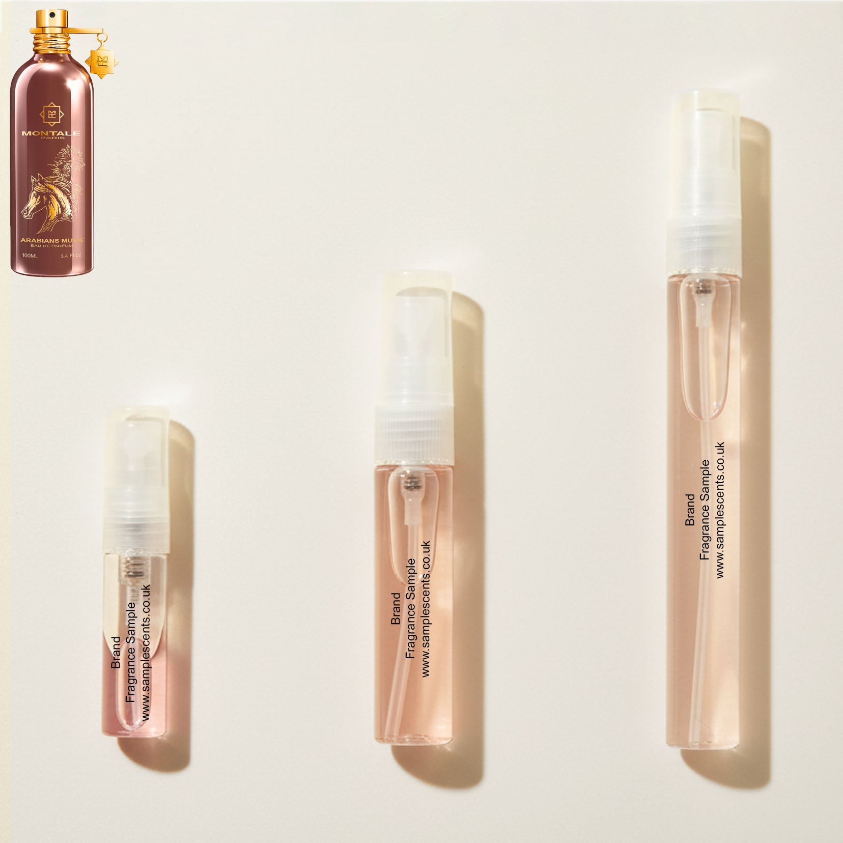 Perfume sample atomisers shown for size reference, hand-decanted from Montale Arabians Musk bottle.