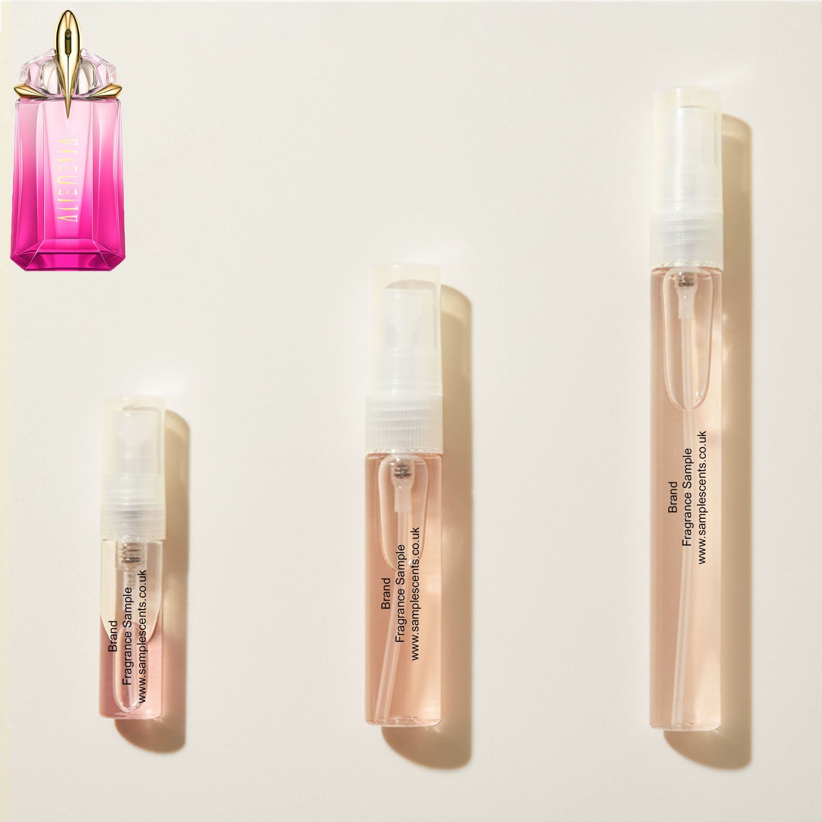 Perfume sample atomisers shown for size reference, hand-decanted from Mugler Alien Pulp bottle.