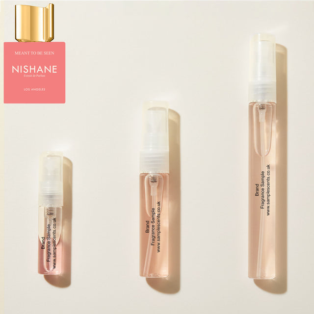 Perfume sample atomisers shown for size reference, hand-decanted from Nishane Meant To Be Seen bottle.