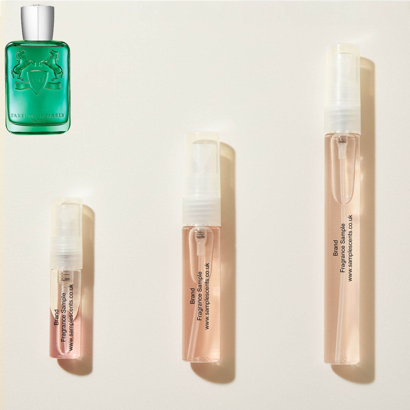 Perfume sample atomisers shown for size reference, hand-decanted from Parfums De Marly Greenley bottle.