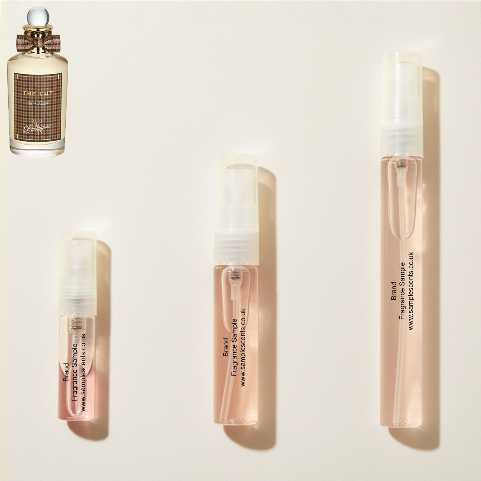 Perfume sample atomisers shown for size reference, hand-decanted from Penhaligons The Cut bottle.