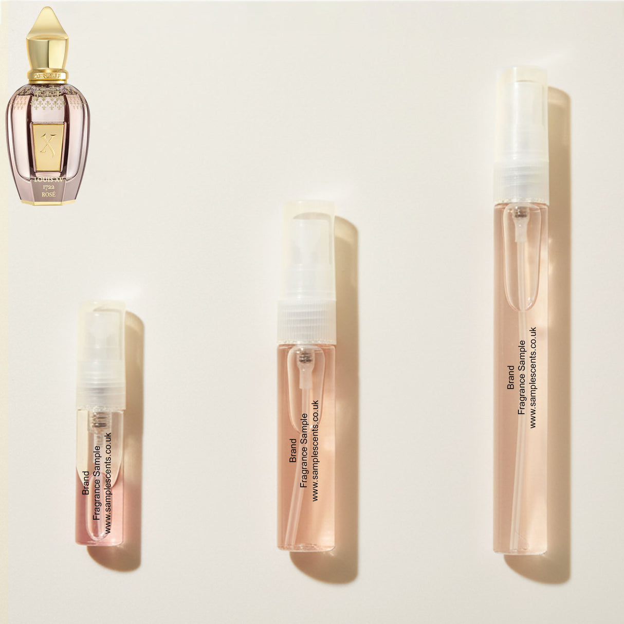 Perfume sample atomisers shown for size reference, hand-decanted from Xerjoff Louis XV 1722 Rose bottle.