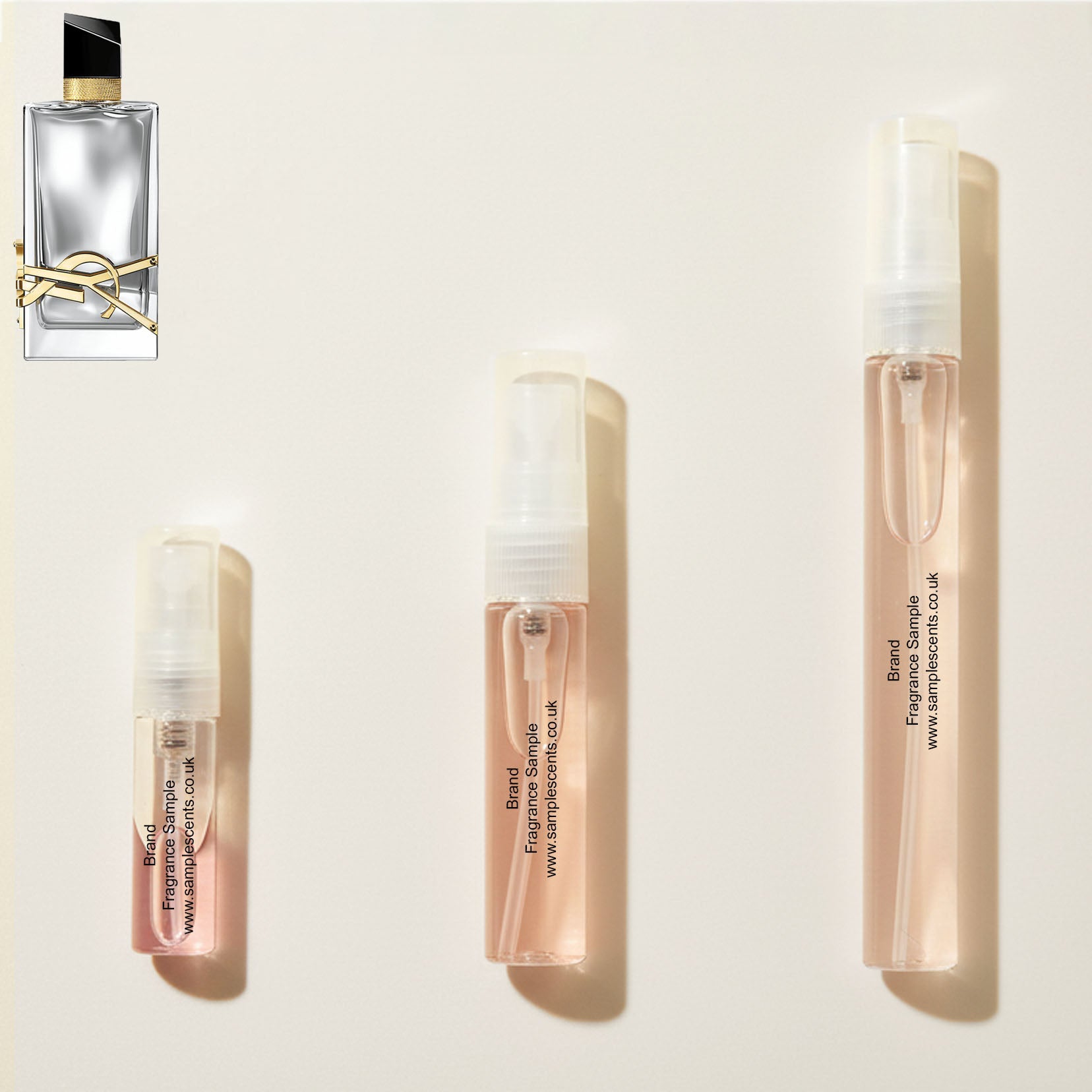 Perfume sample atomisers shown for size reference, hand-decanted from YSL Libre L'Absolu Platine EDP bottle.